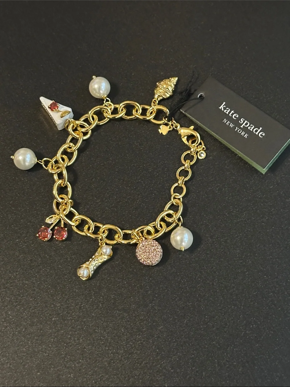 Kate Spade New York Gold-Tone Charm Bracelet with Faux Pearls & Whimsical Charms - Picture 2 of 3